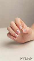 Hand with flowers nail wraps on a neutral background, featuring the brand NYLIAN.
